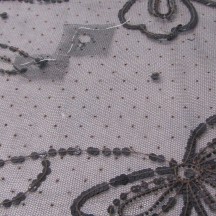 Dégradations et restaurations dans le tulle brodé 